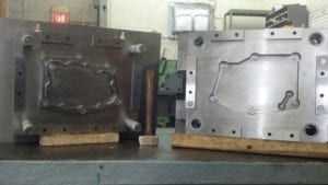 Caterpillar transmission coverCompression Molds